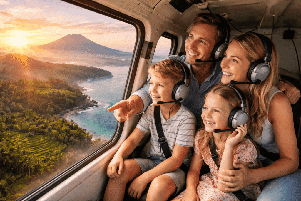 Family enjoying a scenic helicopter ride over a beautiful landscape at sunset, with volcanic mountains and coastline visible through the window. All family members are wearing headsets and smiling, creating a joyful atmosphere.