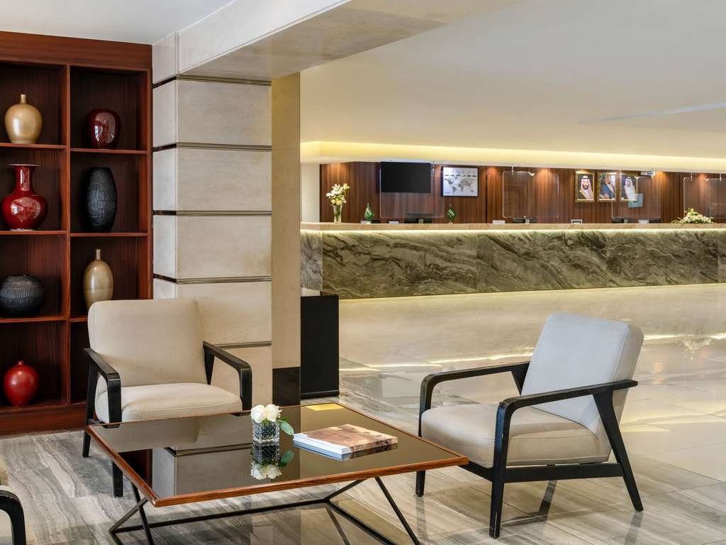 Lobby seating and reception at Anwar Al Madinah Mövenpick